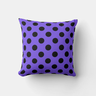 Black polka dots on periwinkle cushion