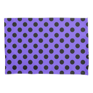 Black polka dots on periwinkle pillowcase