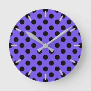 Black polka dots on periwinkle round clock