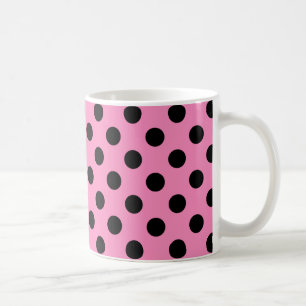 Black polka dots on pink coffee mug
