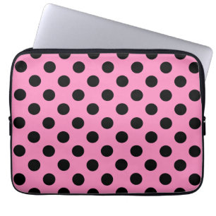 Black polka dots on pink laptop sleeve