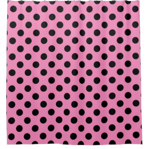 Black polka dots on pink shower curtain