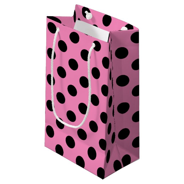 Black polka dots on pink small gift bag (Front Angled)