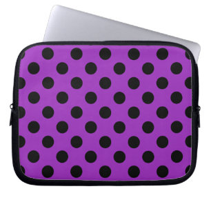 Black polka dots on purple laptop sleeve