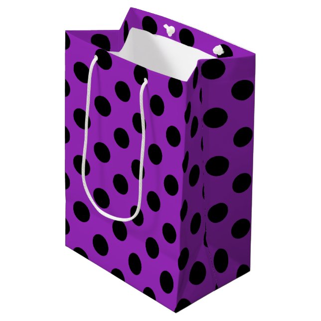 Black polka dots on purple medium gift bag (Front Angled)