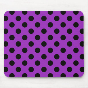 Black polka dots on purple mouse mat