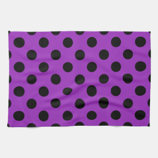 Black polka dots on purple tea towel