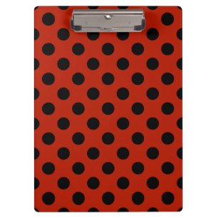 Black polka dots on red clipboard