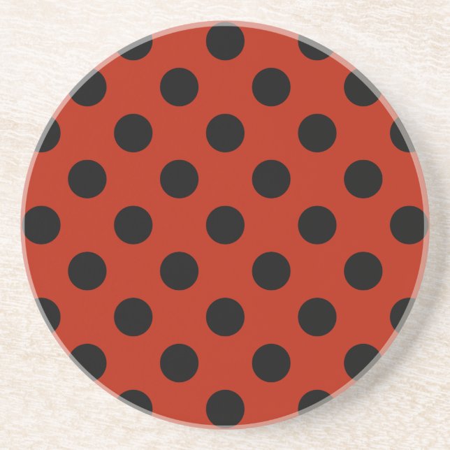 Black polka dots on red coaster (Front)