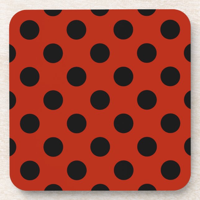 Black polka dots on red coaster (Front)