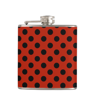 Black polka dots on red hip flask
