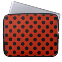 Black polka dots on red