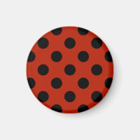 Black polka dots on red
