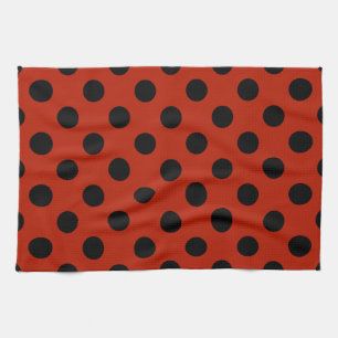Black polka dots on red tea towel