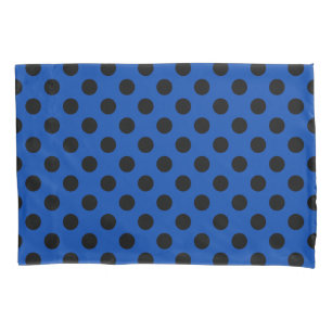 Black polka dots on royal blue pillowcase