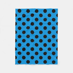 Black polka dots on sky blue fleece blanket