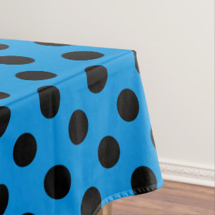 Black polka dots on sky blue tablecloth