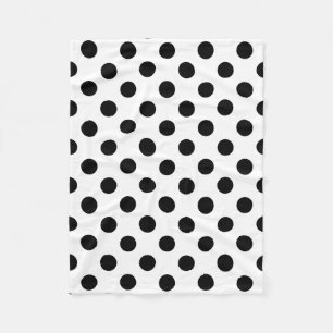Black polka dots on white fleece blanket