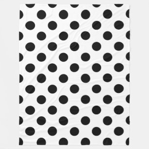 Black polka dots on white fleece blanket