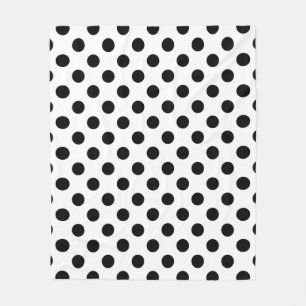 Black polka dots on white fleece blanket