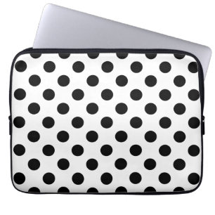 Black polka dots on white laptop sleeve