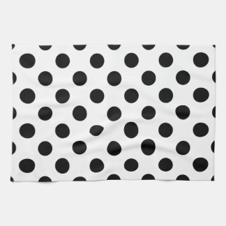 Black polka dots on white tea towel