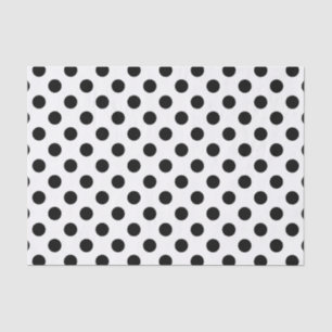 Black polka dots on white tissue paper