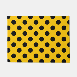 Black polka dots on yellow doormat