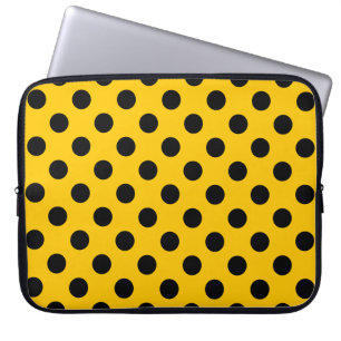 Black polka dots on yellow laptop sleeve