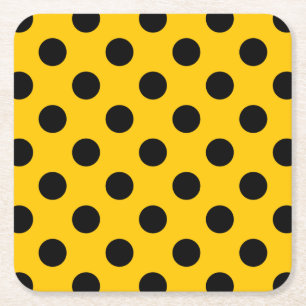 Black polka dots on yellow square paper coaster