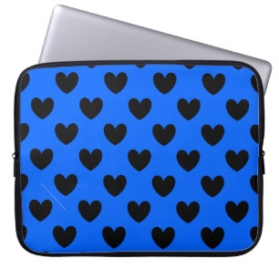 Black polka hearts on blue laptop sleeve