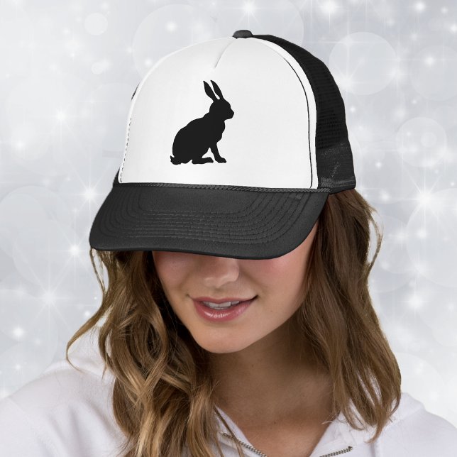 Black Rabbit Silhouette Trucker Hat (Black silhouette of sitting bunny rabbit with big ears on ball cap.)