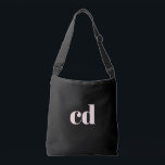 Black rose gold initials monogram elegant modern crossbody bag<br><div class="desc">A classic chic black background. Personalise and add your monogram initials written with girly and feminine rose gold coloured block letters. Modern,  trendy and simple.</div>