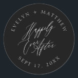 Black Round Happily Ever After Calligraphy Wedding Classic Round Sticker<br><div class="desc">This envelope seal sticker features "Happily Ever After" in a chic calligraphy script font in the centre with your names and wedding date in a round serif typography in white placed on top of a black background. Perfect for couples who love minimalist and simple designs! This product is part of...</div>