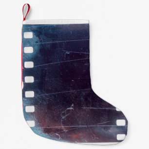 black scratched 35mm film frame, emulsion texture small christmas stocking