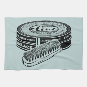 Black shoe polish tin tea towel