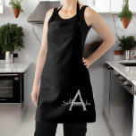 Black Silver Modern Script Girly Monogram Name Apron<br><div class="desc">Black and Silver Monogram Name Apron. This makes the perfect sweet 16 birthday,  wedding,  bridal shower,  anniversary,  baby shower or bachelorette party gift for someone that loves glam luxury and chic styles.</div>