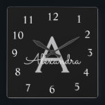 Black Silver Modern Script Girly Monogram Name Square Wall Clock<br><div class="desc">Silver and Black Script Monogram Name Clock. This makes the perfect sweet 16 birthday,  wedding,  bridal shower,  anniversary,  baby shower or bachelorette party gift for someone that loves glam luxury and chic styles.</div>