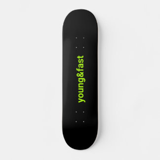 Black skateboard with a print "young and fast".
