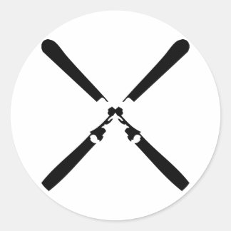 black skier crossed classic round sticker