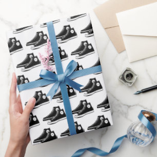 Black Sneakers on White Wrapping Paper