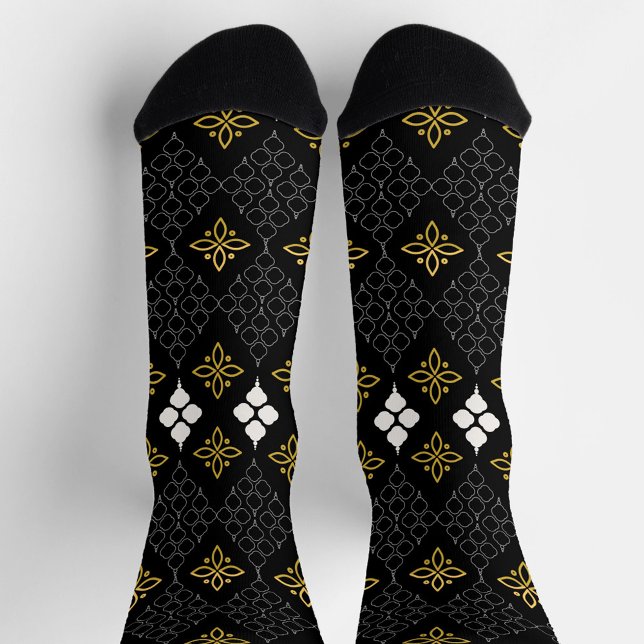Black socks featuring a gold and white pattern  (Creator Uploaded)