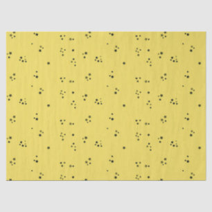 Black stars on yellow tissue paper