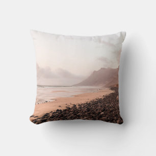 BLACK STONES ON SEASHORE CUSHION