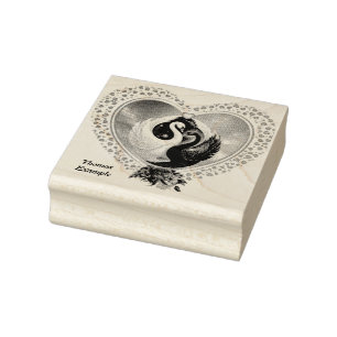 Black swan and a white swan rubber stamp
