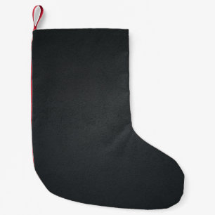 Black textile in close up photography small christmas stocking