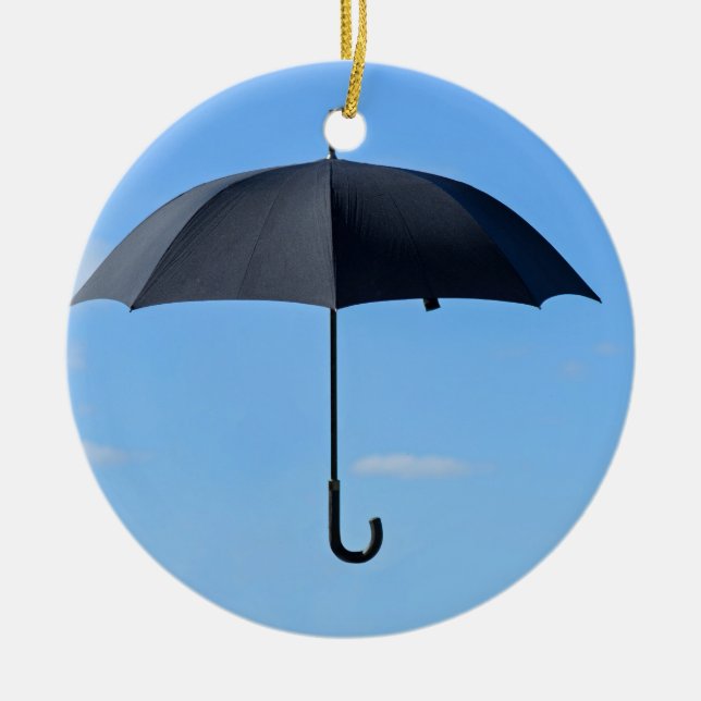 Black umbrella flies in blue sky ceramic tree decoration (Front)