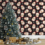 Black Vintage Santa Claus Christmas Wallpaper<br><div class="desc">Bring the magic of the holidays into your home with this black vintage Santa Claus Christmas wallpaper. Featuring charming illustrations of Santa's cheerful face and delicate snowflakes against a black background, this design adds a festive and nostalgic touch to any room. Perfect for creating a cosy and merry atmosphere, this...</div>