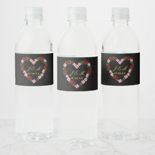 Black water bottle label with a pink and red heart