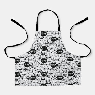 Black white cats faces pattern apron